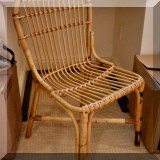 F40. One of a pair of rattan side chairs. 